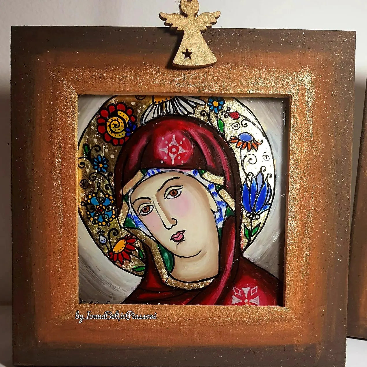 Mother of god:sacred light on glass